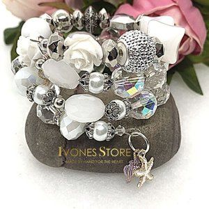 Beautiful memory white/silver beaded bracelets amazing charms and details